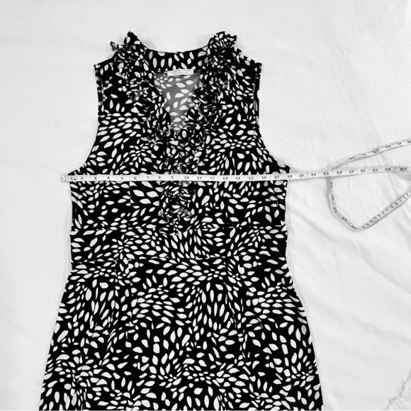 London Style Sleeveless Ruffle Dress | Black White V Neck Knee Length Polka Dot - Picture 6 of 9